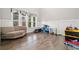 Bright living room showcasing large windows, neutral walls, and modern flooring at 322 Woodridge Pass, Canton, GA 30114