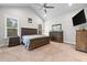 Spacious main bedroom featuring a vaulted ceiling, large windows, and wood furniture at 322 Woodridge Pass, Canton, GA 30114