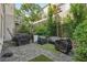 Backyard featuring a patio area with a sitting area at 1290 Nervi Nw Mews, Atlanta, GA 30318