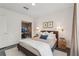 Cozy bedroom with a comfortable bed, soft lighting, and a connected office at 1290 Nervi Nw Mews, Atlanta, GA 30318