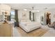Bright bedroom features a comfortable bed, stylish decor, and natural light at 1290 Nervi Nw Mews, Atlanta, GA 30318