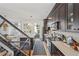 Bright kitchen features dark wood cabinets, stainless appliances, and white countertops at 1290 Nervi Nw Mews, Atlanta, GA 30318