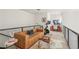 Modern living room with comfortable seating, workspace, and exercise equipment at 1290 Nervi Nw Mews, Atlanta, GA 30318