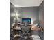Efficient home office space with modern furniture and ample lighting at 1290 Nervi Nw Mews, Atlanta, GA 30318