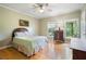 Serene bedroom with hardwood floors, natural light, and a neutral color palette creating a relaxing atmosphere at 400 Simpson Ne Rd, White, GA 30184