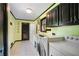 Well-equipped laundry room with modern appliances, ample storage, and stylish finishes at 400 Simpson Ne Rd, White, GA 30184