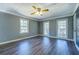 Inviting bedroom with three large windows providing ample natural light at 1103 Wallington Nw Ct, Conyers, GA 30012