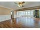 Spacious living room featuring multiple windows and a wood-burning stove at 1103 Wallington Nw Ct, Conyers, GA 30012