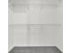 Walk-in closet with shelves, bars, and neutral carpet at 187 Gilberts Way, Temple, GA 30179