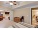 Open bedroom with a view of the bath and entertainment room at 262 Sandhurst Ct, Suwanee, GA 30024