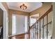 Bright foyer with hardwood floors and staircase leading to the upper level at 262 Sandhurst Ct, Suwanee, GA 30024