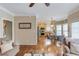 Open-concept living area flows into the kitchen, perfect for entertaining and Gathering time at 262 Sandhurst Ct, Suwanee, GA 30024