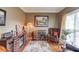 Comfortable living room with hardwood floors, a fireplace, and a cozy atmosphere at 262 Sandhurst Ct, Suwanee, GA 30024