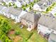 Beautiful backyard featuring a lush lawn, mature trees, and patio furniture at 2887 Regal Park Ct, Duluth, GA 30096