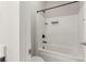 Bathroom featuring a shower and tub combination with bronze hardware at 2887 Regal Park Ct, Duluth, GA 30096