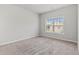 Well-lit bedroom with a large window providing natural light at 2887 Regal Park Ct, Duluth, GA 30096
