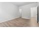 Spacious bedroom featuring neutral colors and wood-look flooring at 2887 Regal Park Ct, Duluth, GA 30096