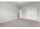 Bedroom featuring carpet and access to a closet and a hallway at 2887 Regal Park Ct, Duluth, GA 30096
