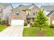 Charming brick two-story home with well-manicured lawn and attached two-car garage at 2887 Regal Park Ct, Duluth, GA 30096