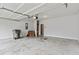 Spacious garage with neutral walls and concrete floors, ready for storage and projects at 2887 Regal Park Ct, Duluth, GA 30096