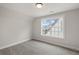 Cozy bedroom with carpet has a large window providing ample natural light at 4002 Potter Way, Woodstock, GA 30188