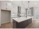 Modern kitchen featuring a center island and stainless steel appliances at 4002 Potter Way, Woodstock, GA 30188