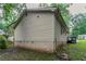 Back exterior of the home and backyard are visible from this vantage point at 2045 Scarbrough Dr, Stone Mountain, GA 30088