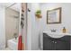 Well-lit bathroom with modern fixtures and a shower with a neutral-tone tile surround at 2826 Ben Hill Rd, Atlanta, GA 30344
