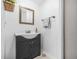 Clean and functional bathroom with modern vanity, mirror, and ample lighting at 2826 Ben Hill Rd, Atlanta, GA 30344