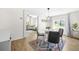 Dining room with hardwood floors and view into living room area at 2826 Ben Hill Rd, Atlanta, GA 30344