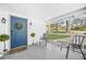 Inviting covered front porch with seating and charming decor at 2826 Ben Hill Rd, Atlanta, GA 30344