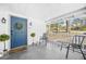 Inviting covered front porch with seating and charming decor at 2826 Ben Hill Rd, Atlanta, GA 30344