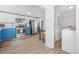 Open kitchen area with modern appliances, view to laundry room at 2826 Ben Hill Rd, Atlanta, GA 30344