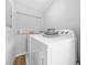 Bright laundry room with modern washer and dryer at 2826 Ben Hill Rd, Atlanta, GA 30344