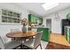 Bright dining area features a round table, stylish chairs, and natural light at 3580 Raymond Dr, Atlanta, GA 30340