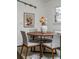 Cozy dining area featuring a round wood table and stylish chairs at 3580 Raymond Dr, Atlanta, GA 30340