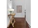 Clean entryway features neutral walls, wood floors and a trendy decor tray at 3580 Raymond Dr, Atlanta, GA 30340