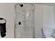 Bathroom with glass shower and toilet at 3991 Adamsville Sw Dr, Atlanta, GA 30331