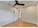 Bedroom featuring hardwood floors, white door, and ample natural light at 3991 Adamsville Sw Dr, Atlanta, GA 30331