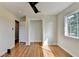 Bedroom featuring hardwood floors and a closet with an open door at 3991 Adamsville Sw Dr, Atlanta, GA 30331