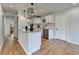 Modern kitchen features granite countertops, stainless steel appliances, and white cabinets at 3991 Adamsville Sw Dr, Atlanta, GA 30331