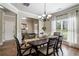 Charming dining room with a view to the entryway and features a dining table and natural light at 4305 Hunters Walk Way, Cumming, GA 30028