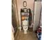 Bathroom with tiled walls, toilet, storage cabinet, and walk-in shower at 60 King Blvd, Mcdonough, GA 30253