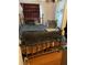 Bedroom with a brass bed frame and hardwood floors at 60 King Blvd, Mcdonough, GA 30253