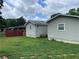 Residential home exterior with yard and fencing showing at 60 King Blvd, Mcdonough, GA 30253