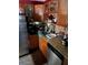 A kitchen with wooden cabinets, tile backsplash and granite countertops at 60 King Blvd, Mcdonough, GA 30253