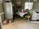 Kitchen with a refrigerator, dining table, and tiled floors at 60 King Blvd, Mcdonough, GA 30253