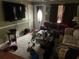 Comfortable living room with a large screen TV, two couches and carpet at 60 King Blvd, Mcdonough, GA 30253