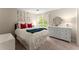 Bright bedroom featuring a large window, white dresser, and decorative butterfly wall art at 1540 Kinglet Ln, Marietta, GA 30062