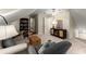 Bonus room with sofa, armchair, and adjacent room at 1540 Kinglet Ln, Marietta, GA 30062